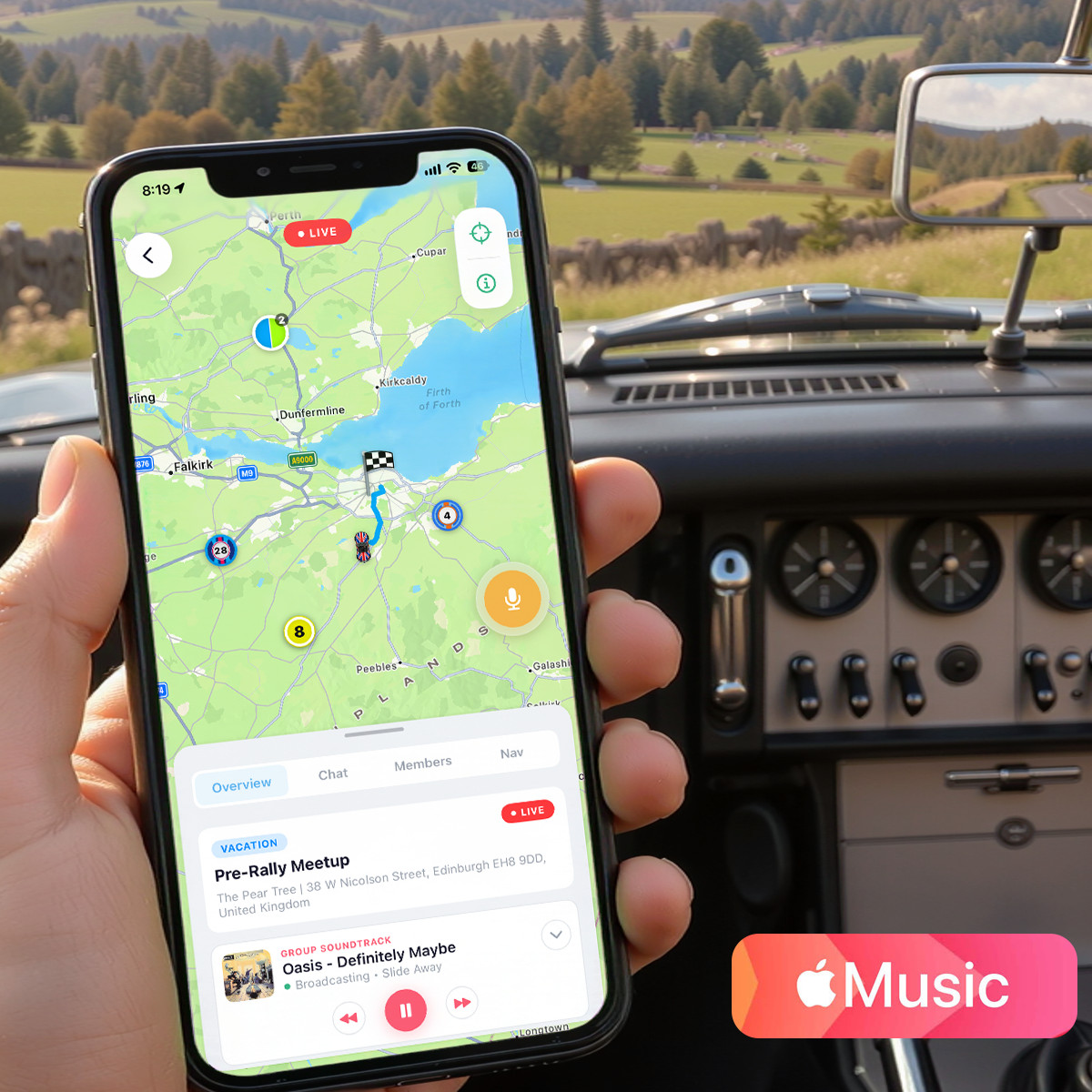 A hand holding an iPhone in a classic car in the Scottish countryside: Caravan showing a live rally meetup around Edinburgh with friends’ pucks and a route to the checkered flag, and the Group Soundtrack card playing from Apple Music.